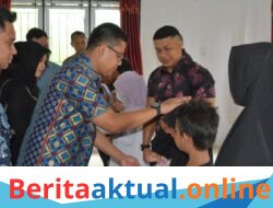 Wali Kota Langsa Serahkan Seragam Sekolah Gratis bagi 276 Anak Yatim Piatu di Langsa Barat