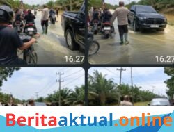 Banjir Rendam Jalan Sumor bor-Tanjung Selamat, Polsek Padang Tualang Sigap Atur Lalu Lintas
